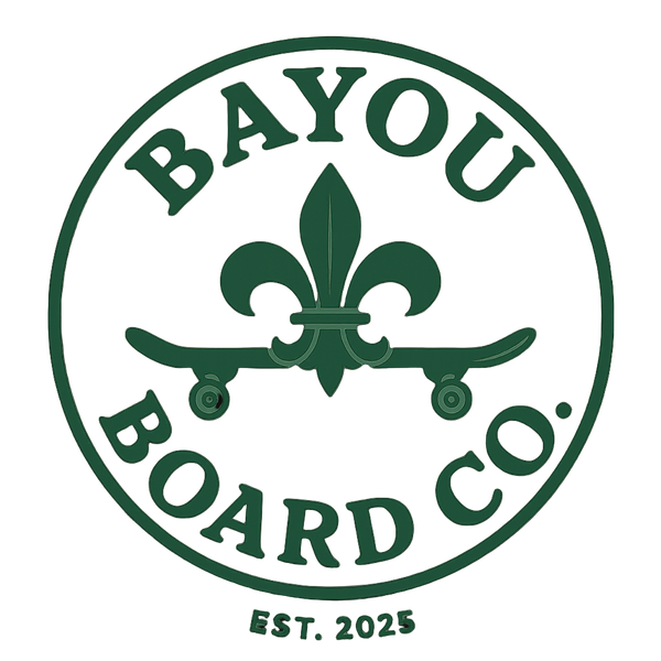 Logo of Bayou Board Co. with a skateboard and fleur-de-lis design on a black background